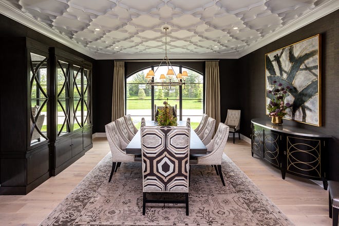 This stunning five-bedroom house in West Des Moines features a two-story great room, elegant dining room and serene and spa-like bathroom.