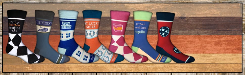 Banner image of seven different types of socks all lined up in a row.