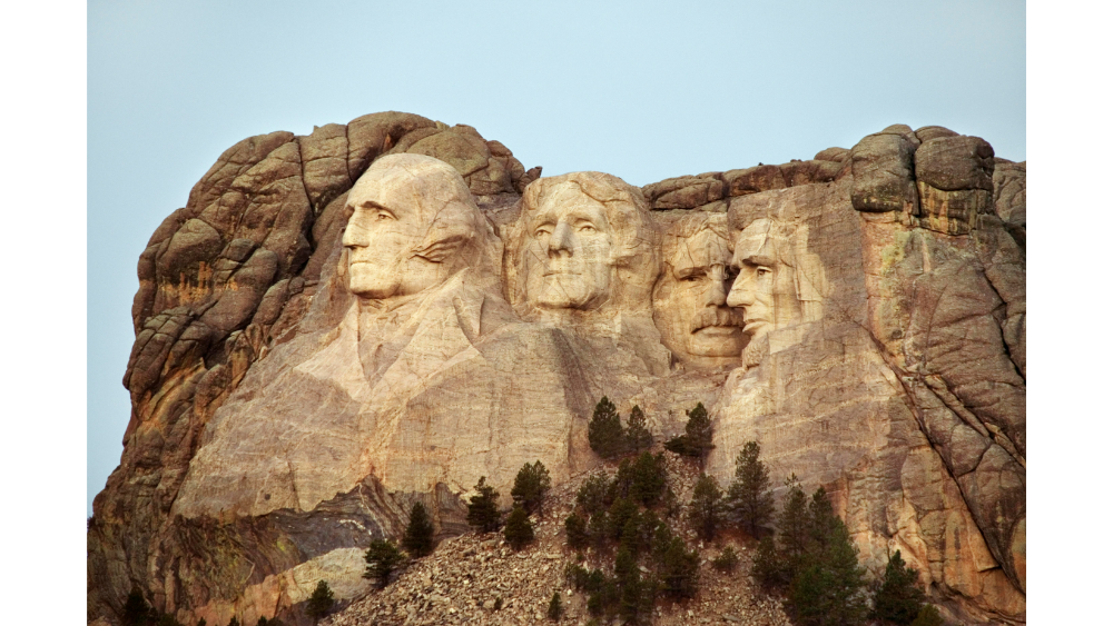 Famous rock sculpture of four U.S. presidents carved into the granite face of Mount Rushmore.