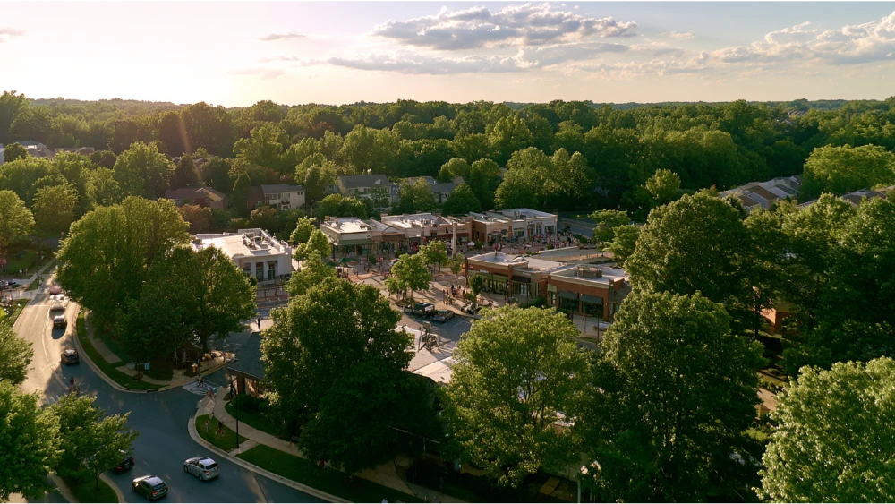 Columbia Maryland planned community with wooded neighborhoods, lake, walking paths, village center, and everyday local activity