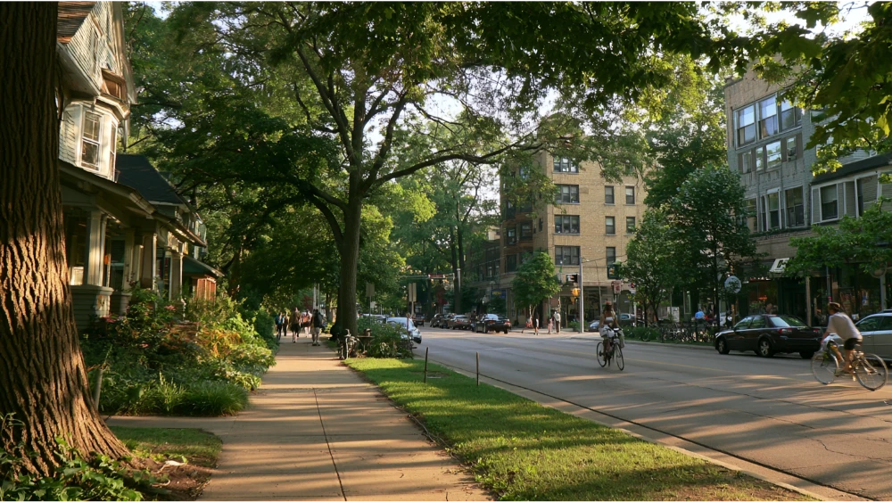 Everyday residential and urban life in Ann Arbor Michigan with pedestrians, cyclists, and local businesses