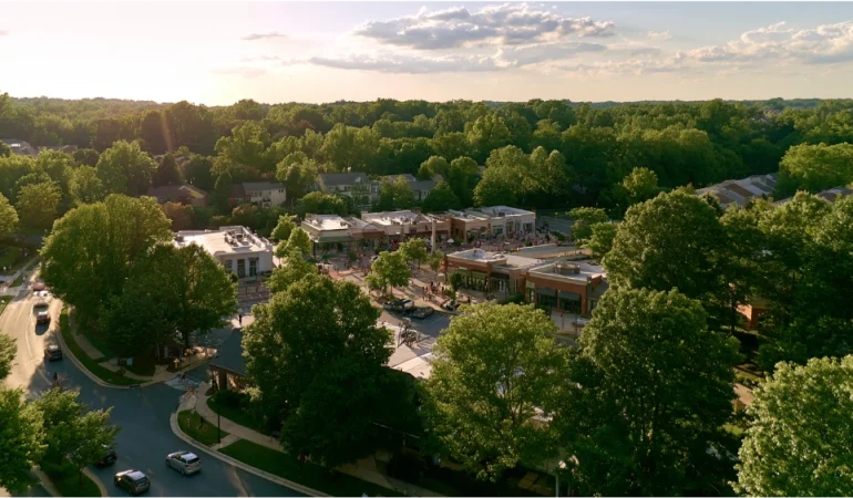 Columbia Maryland planned community with wooded neighborhoods, lake, walking paths, village center, and everyday local activity