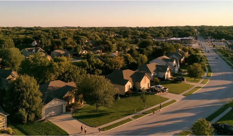 Authentic Gardner, Kansas neighborhood with newer homes, mature trees, local residents, and small-town suburban life