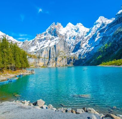 Amazing,Tourquise,Oeschinnensee,With,Waterfalls,And,Swiss,Alps,,Kandersteg,,Berner