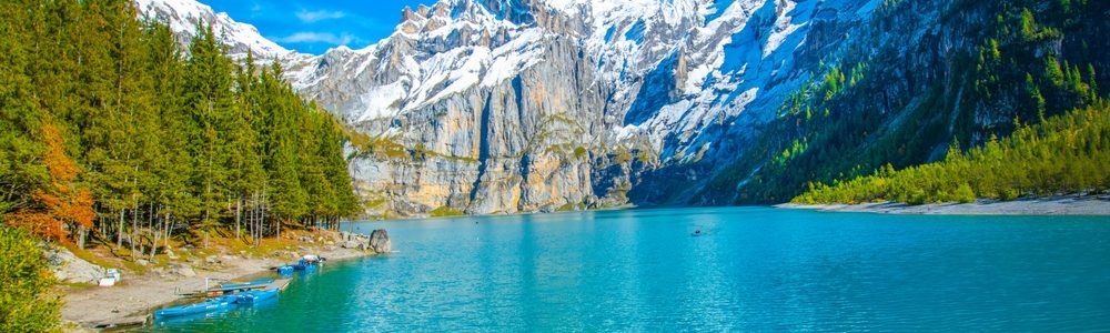 Amazing,Tourquise,Oeschinnensee,With,Waterfalls,And,Swiss,Alps,,Kandersteg,,Berner